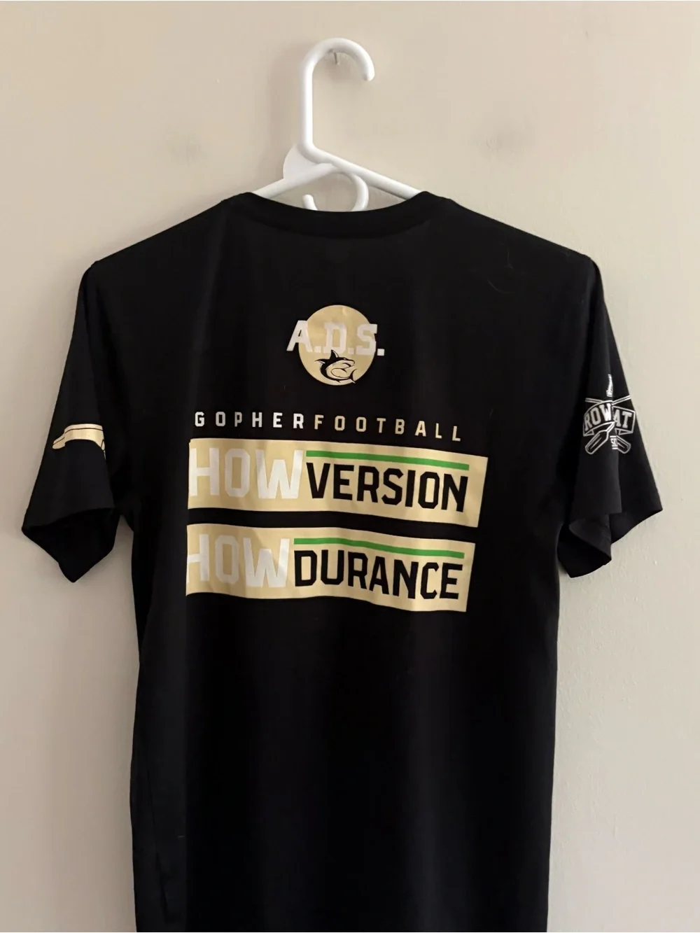 Nike Black Short-Sleeve 'Grow Higher' Graphic Tee with Gold Accents U of M